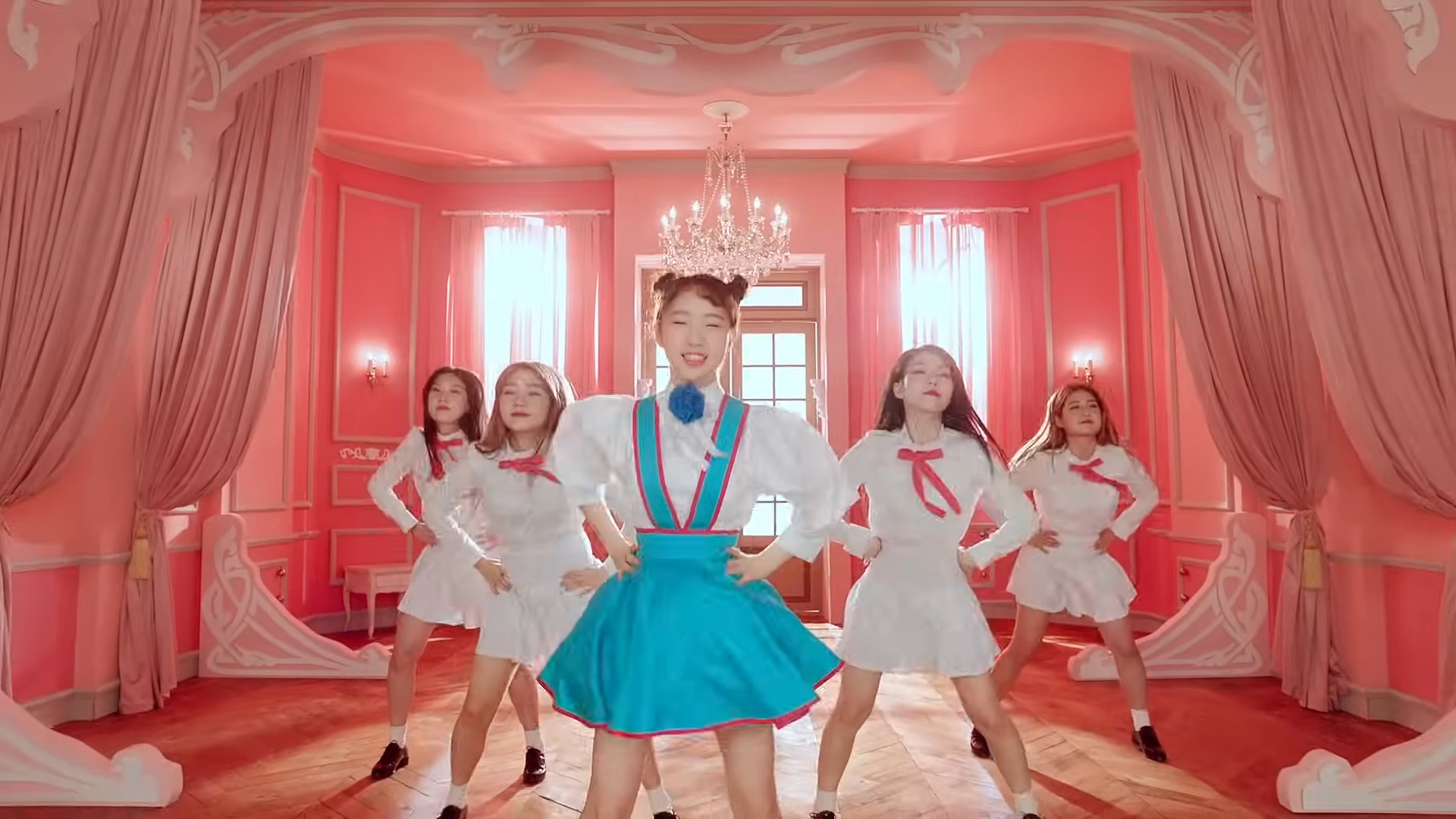 Yeojin dancing with backup dancers.